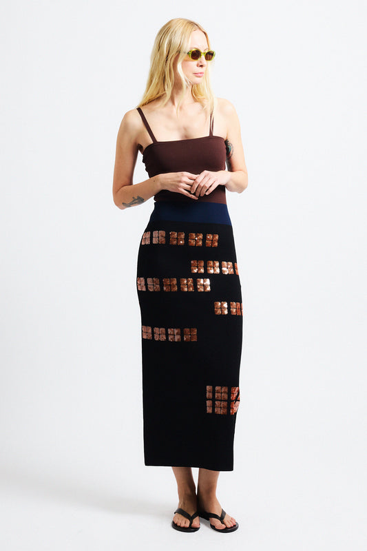 Link to "Antonia" dress. Image is of a female model wearing strapless brown/black sequin dress. 